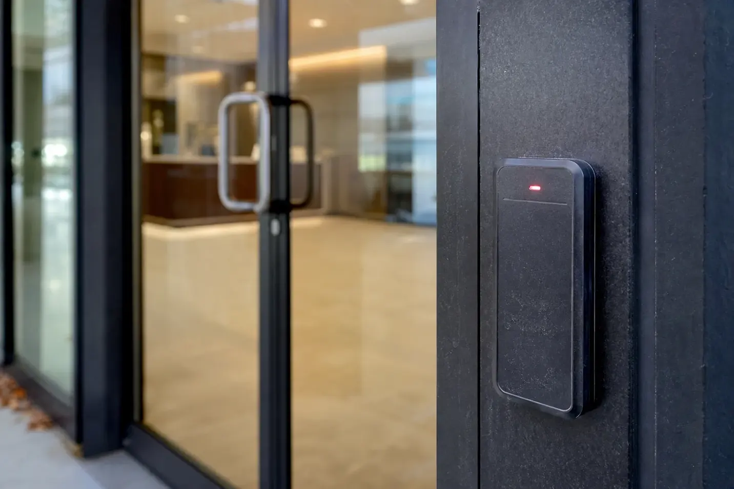 Access control card reader beside an office door
